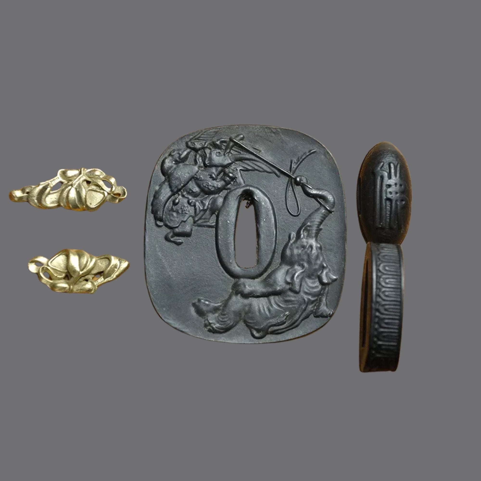 Blackened Steel Tsuba with Elephant and Tengu Engraving | KatanaSwordArt Tsuba For Sale 2025