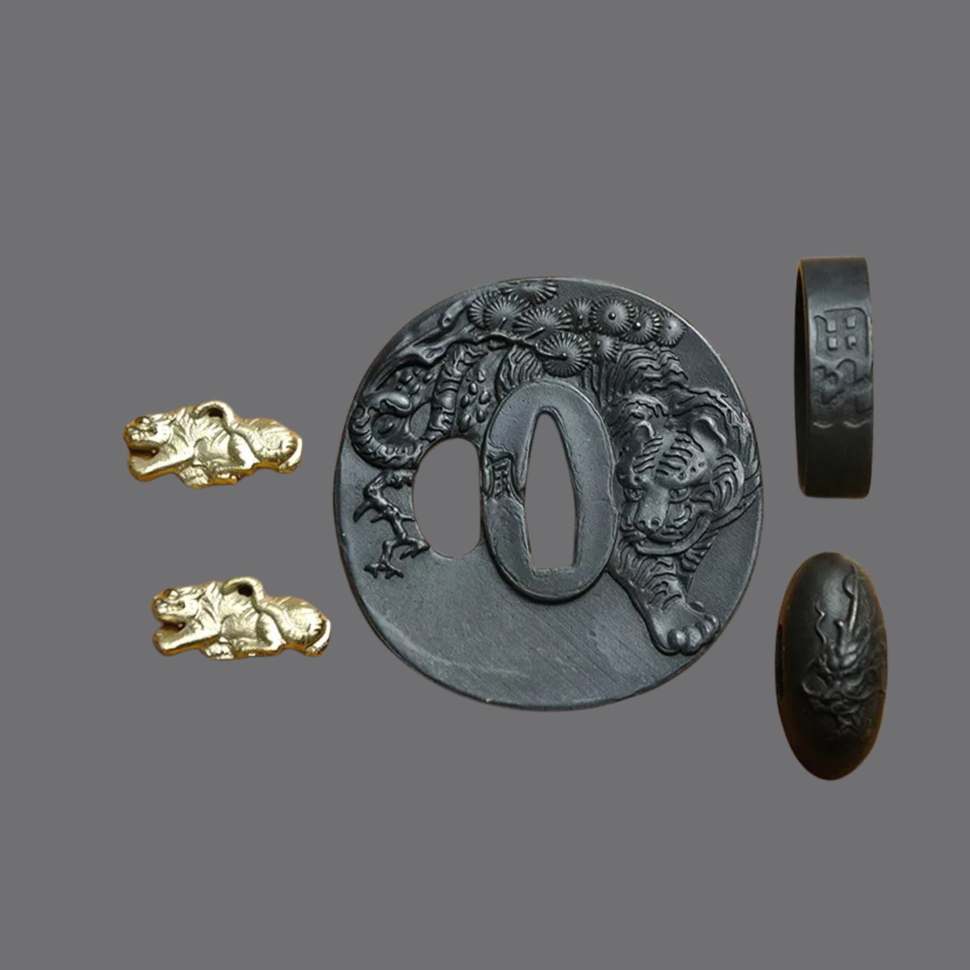 Australia Blackened Steel Tsuba with Tiger and Rabbit Engraving